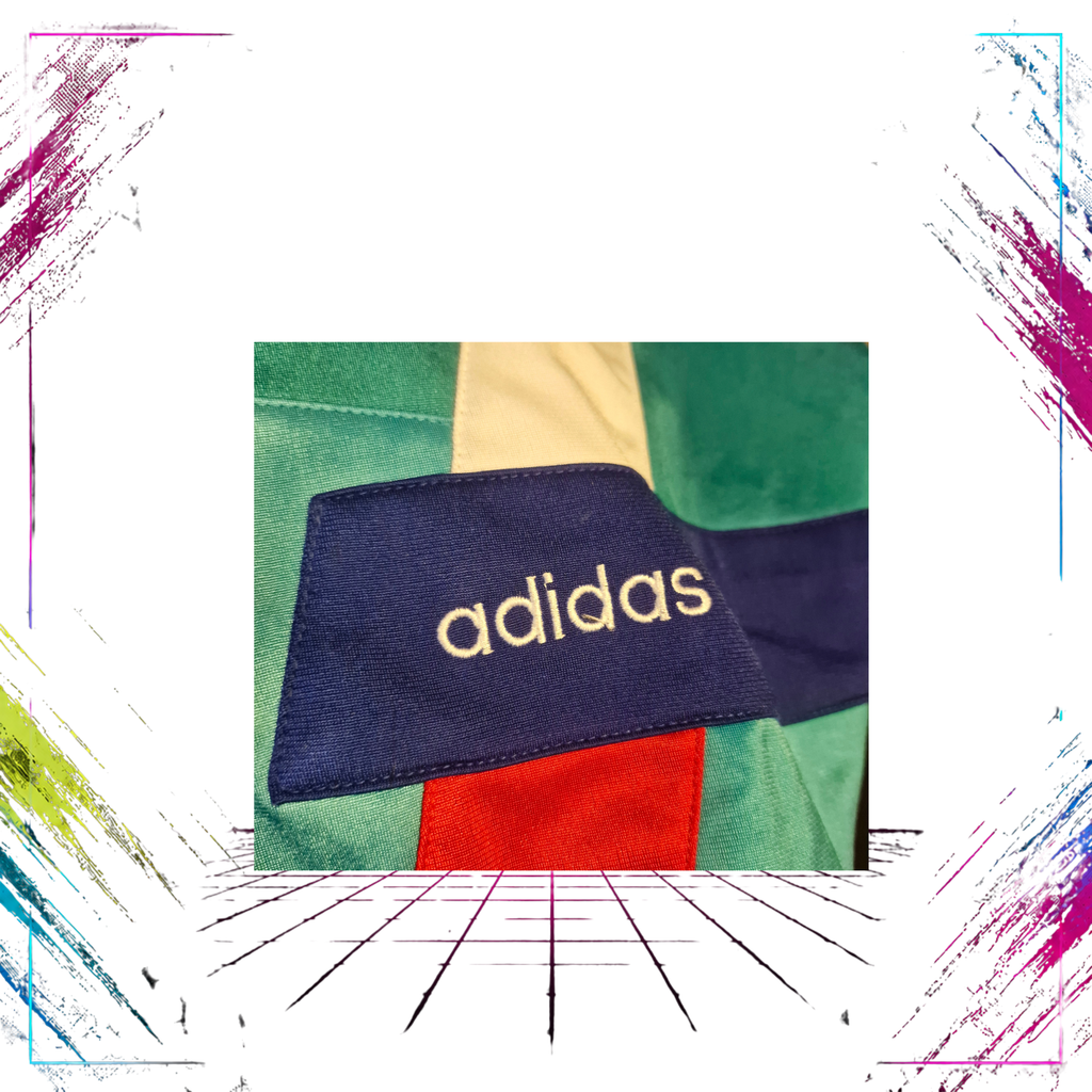 Late 80s Adidas Flag Tag geometric V-line track jacket — Adidas badge detail — ThePlugOfVintage