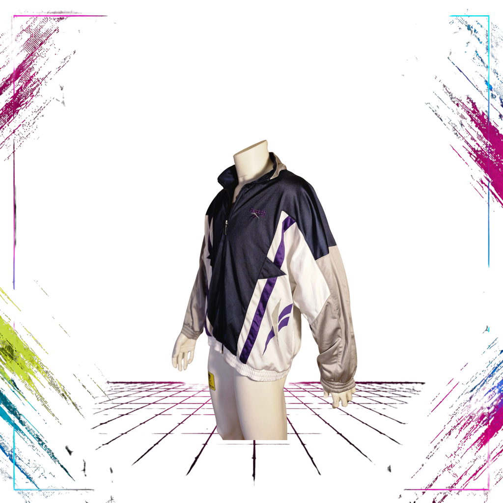 Mid 90s Reebok Vector colour block track jacket — left side view, tribal Vector logo — ThePlugOfVintage