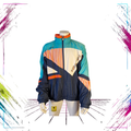 Early 90s Umbro Sultrade colour block windbreaker — front view, red/white/navy/teal — Size L — ThePlugOfVintage