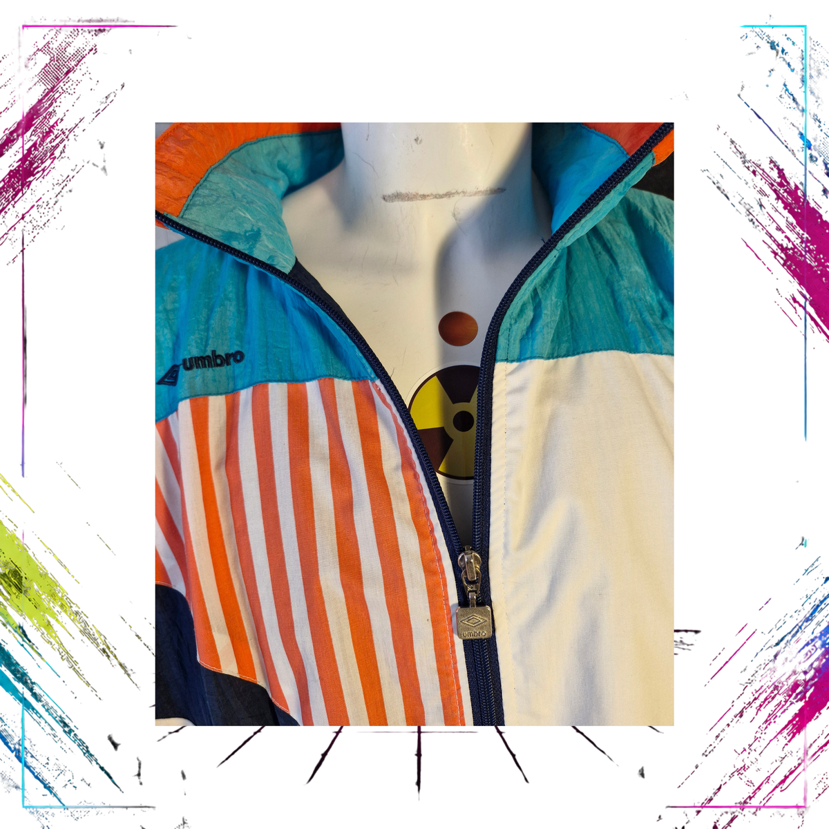 Early 90s Umbro Sultrade colour block windbreaker — front detail, embroidered chest logo — ThePlugOfVintage